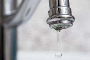 Residents raise voice against recovery of water charges for a period when no regular supply existed in the area.