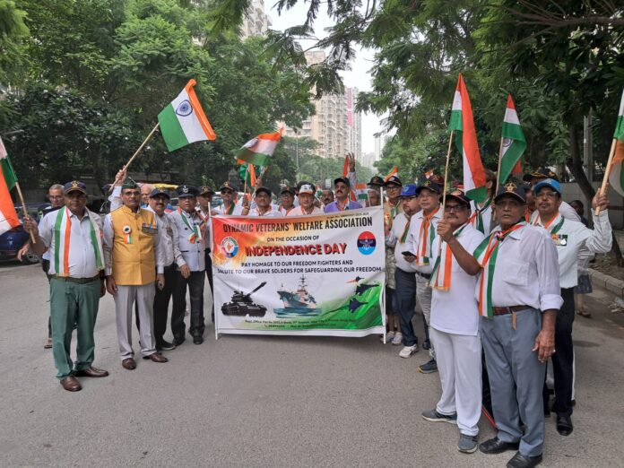 Veterans of the Dynamic Veteran Welfare Association salute the tricolour during the 79th Independence Day celebrations at Dada Dadi Park, Gaur City 1.