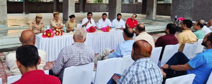 ACP Twinkle Jain and police officials interact with residents during a Police Chaupal held at Sector-112 Community Centre, Noida ACP Twinkle Jain and police officials interact with residents during a Police Chaupal held at Sector-112 Community Centre, Noida