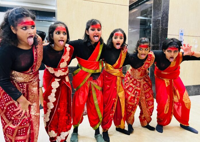 Young participants lighting up the stage with devotion and talent.