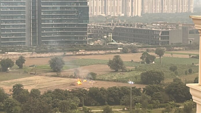 Stubble burning near Gaur Chowk turning GNW into a pollution hotspot; residents raise alarm.