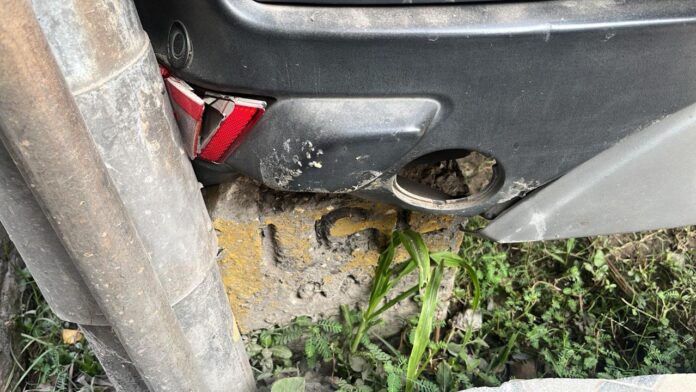 Danger on the streets: A parked car in Sector 19 severely damaged after bulls fight violently nearby.