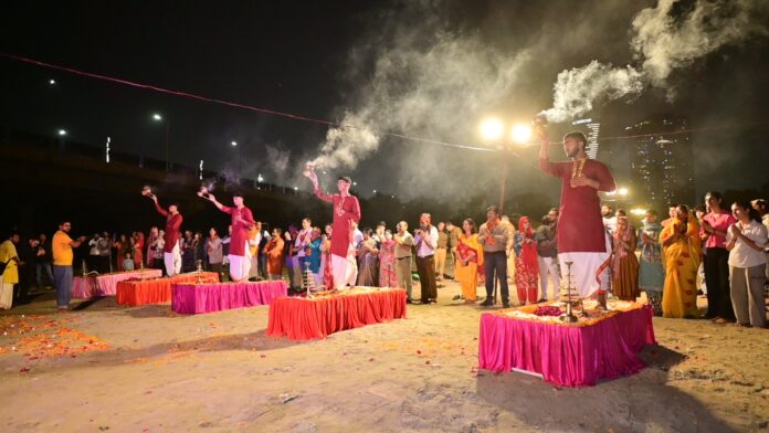 Priests and spiritual leaders performing the sacred Maha Aarti with resonating chants and conch sounds. Priests and spiritual leaders performing the sacred Maha Aarti with resonating chants and conch sounds.