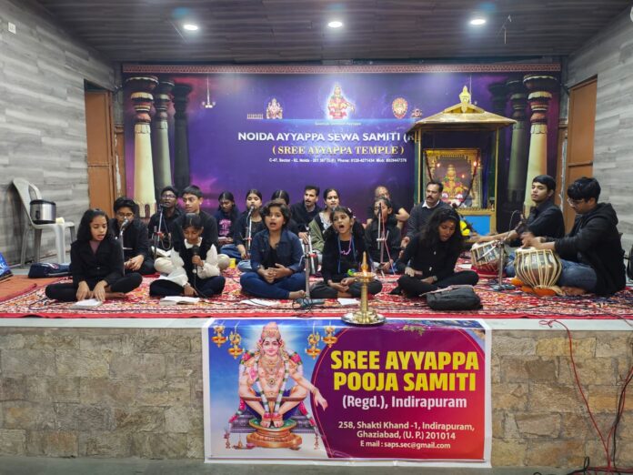 Youth devotees of Shri Ayyappa Pooja Samiti, Indirapuram enchant the Ayyappa Temple, Sector 62 Noida with soulful bhajans during the Mandal Puja celebration.