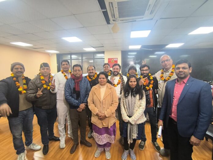 Newly elected members of the Galaxy Vega Apartment Owners’ Association with election officials after the peaceful and transparent AoA elections at Galaxy Vega Society, Greater Noida West, on December 21, 2025.