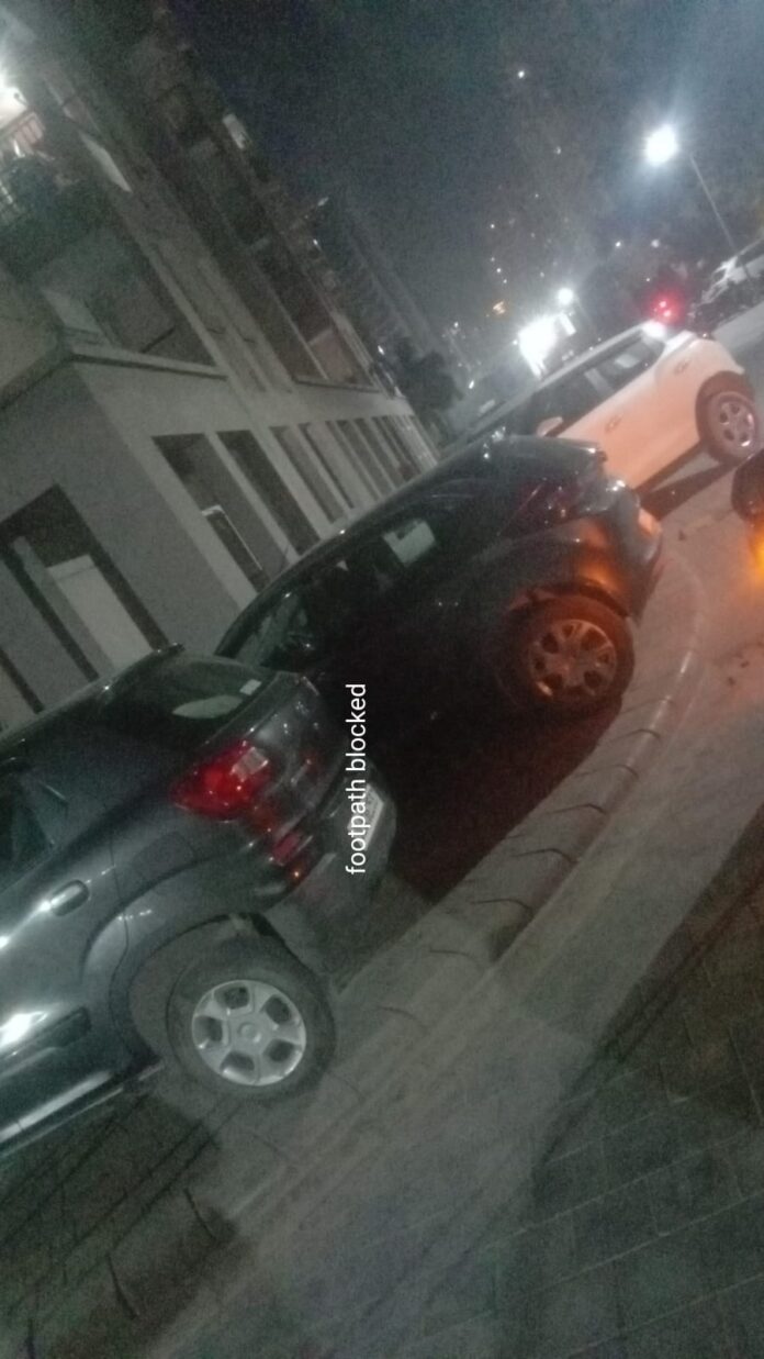 Main entrance gate of Shri Radha Sky Garden, Greater Noida West, where residents allege lapses in vehicle verification and entry control mechanisms. Main entrance gate of Shri Radha Sky Garden, Greater Noida West, where residents allege lapses in vehicle verification and entry control mechanisms.