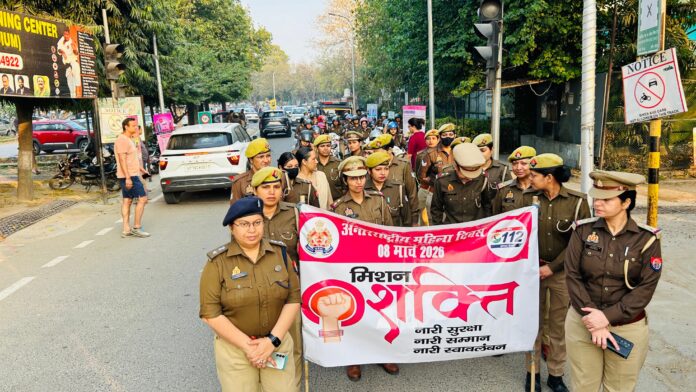 Women police personnel take part in a scooty and foot rally organized by Noida Police on International Women’s Day under the Mission Shakti initiative to spread awareness about women’s safety, empowerment and helpline services in Noida.