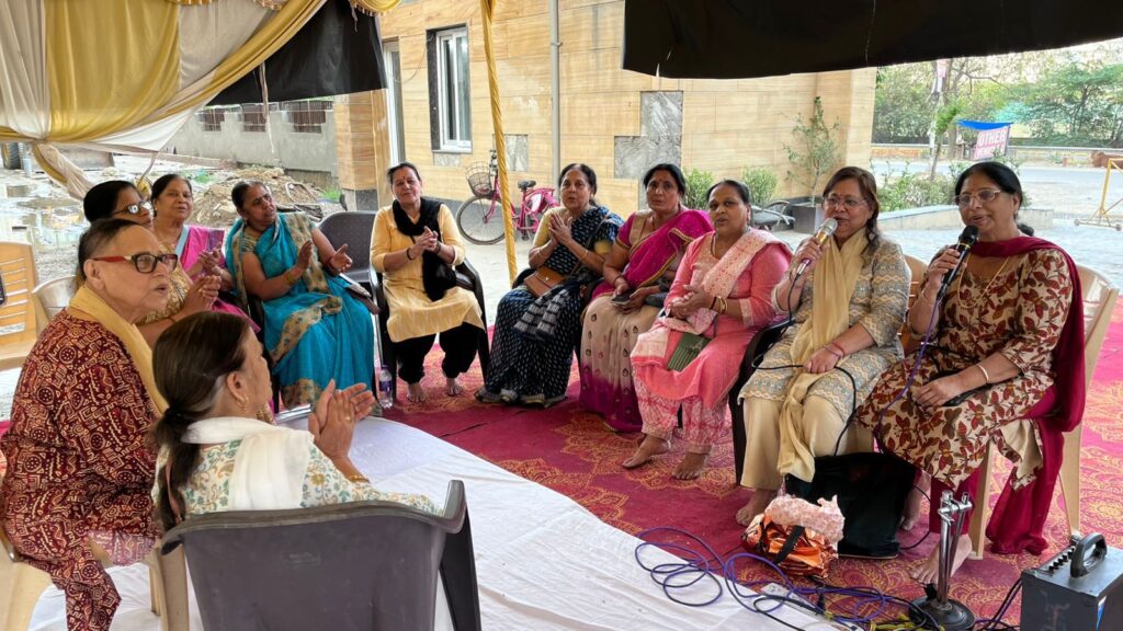 Residents of La Residentia continue their protest with bhajan kirtan, work-from-protest initiative and community activities, showing unity and determination in their fight for basic facilities.