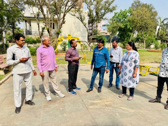 Officials of Greater Noida Authority along with RWA members inspect parks in Beta 1, review damaged gym equipment and broken footpaths, assure early repairs.