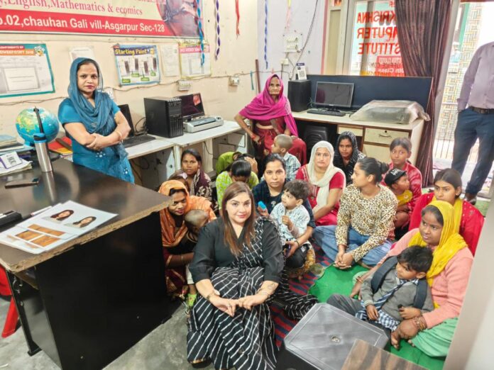 Women and girls participate in a hygiene and confidence awareness session under the Nari Utkarsh Abhiyan in Noida, gaining practical knowledge on health, cleanliness and self-empowerment.