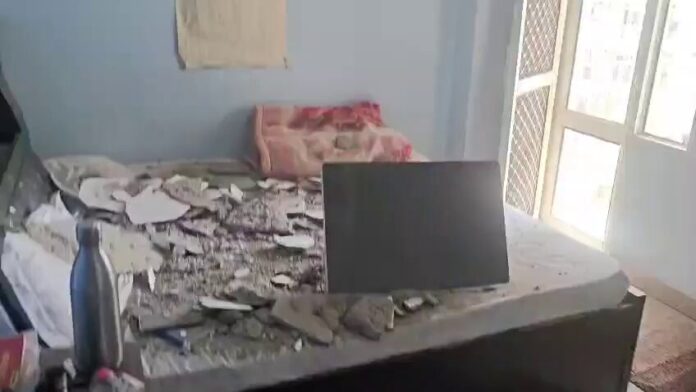 Ceiling plaster collapses inside a flat at Royal Nest Society in Greater Noida West, raising safety concerns among residents.
