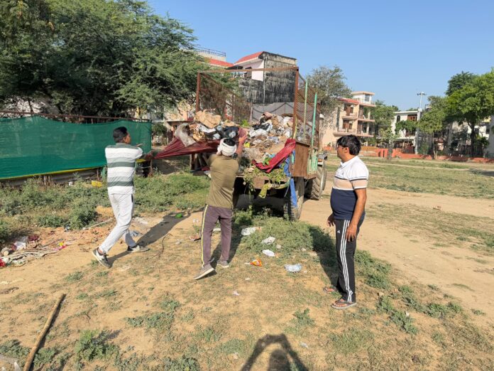 Residents protest against repeated night-time garbage dumping near House A-72 in Sector Beta 1, demand strict fines and immediate action.