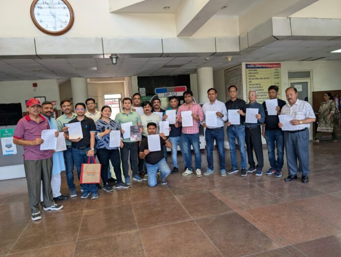 Residents gather at DCP Surajpur office to submit multiple complaints against late-night loudspeaker use at Radha Krishna Park in Gaur City 1.