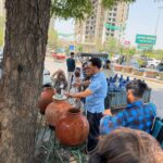 Summer relief in action: Active Citizen Team completes one month of continuous water service at Pari Chowk, helping commuters beat the scorching heat in Greater Noida.