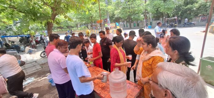 Residents of LIG Udyog Vihar Sector-82 organised a sweet water and sharbat distribution drive on the occasion of Vaishnav Ekadashi, spreading the message of humanity, unity and community service amid the scorching summer heat.