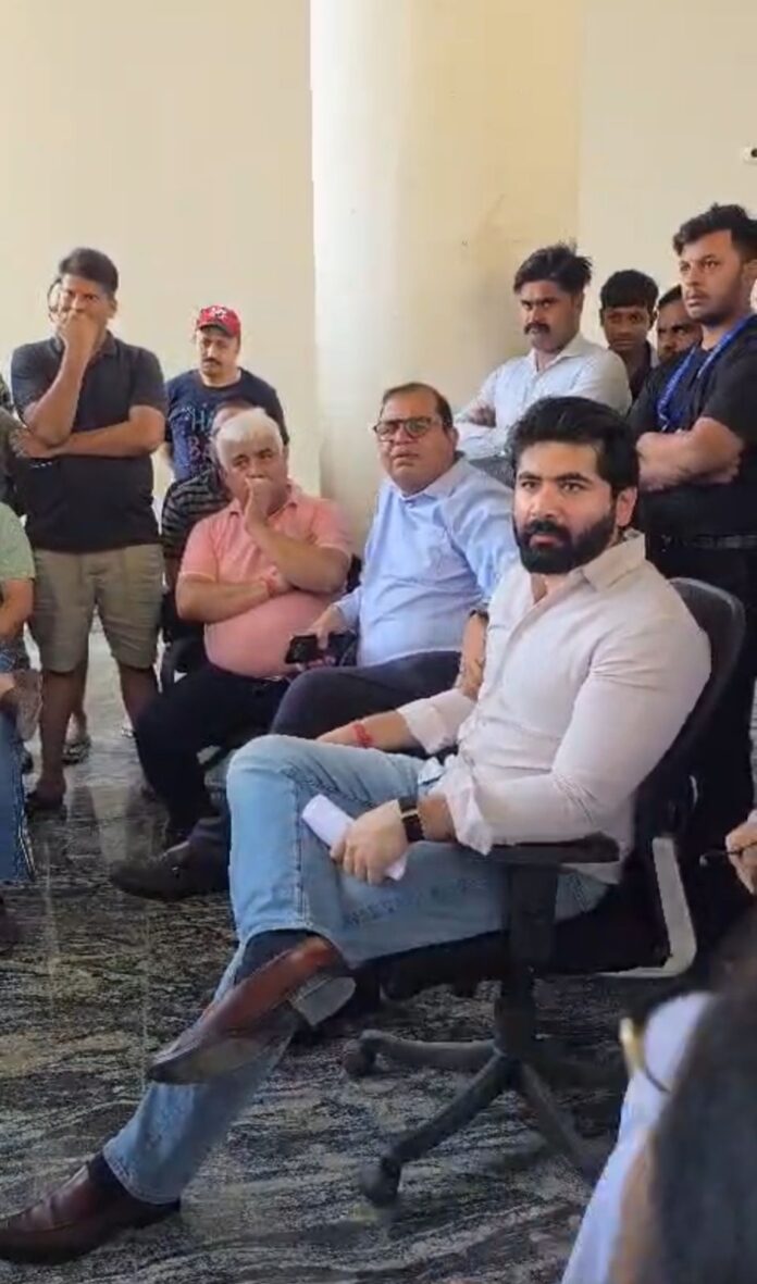 DG charge dispute sparks tension between Capital Athena residents and builder.