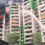 Massive fire breaks out at Gaur Green Avenue Society in Indirapuram, Ghaziabad. Residents rescued amid thick smoke and chaos as multiple flats suffer severe damage.