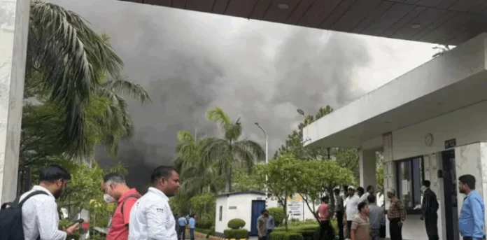 Over 25 fire tenders rushed to Spark Minda’s Sector 59 facility after a massive fire engulfed parts of the factory, sending thick black smoke across Noida and prompting the evacuation of hundreds of workers.