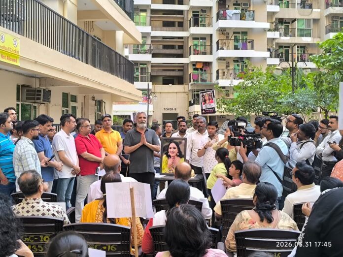 Residents, relatives and family members gather at a condolence meeting in Greater Noida West to pay tribute to Twisha Sharma and renew the call for justice.