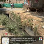 Residents demand a covered drain and pedestrian footpath along the Iteda Gol Chakkar–Shahberi road near ATS Homekraft Nobility amid ongoing road widening work