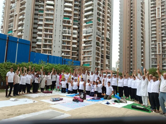 Residents of RG Residency, Sector 120, came together to celebrate the 12th International Yoga Day with enthusiasm, promoting health, wellness and community participation through yoga.