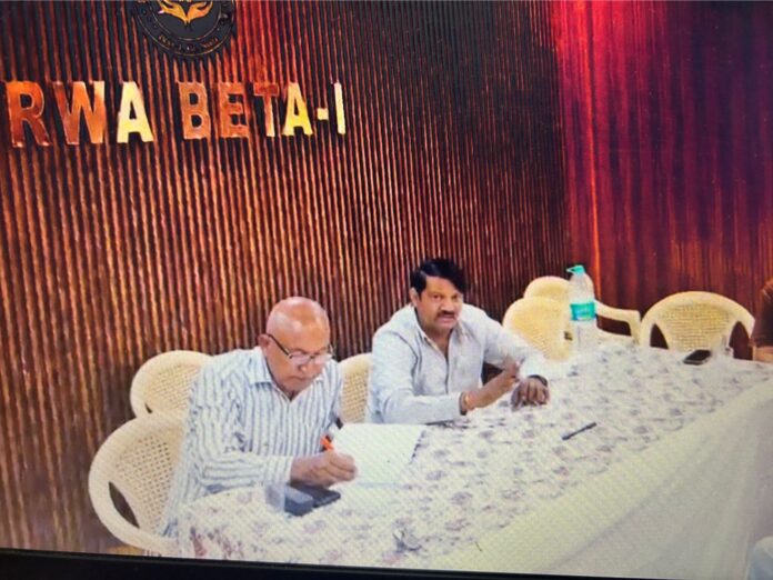 Residents participate in the Beta 1 RWA public hearing at the newly inaugurated RWA office, raising civic and environmental concerns including the demand for tree plantation near Beta Plaza.