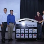 Greater Noida Authority officials flag off the dedicated plastic waste collection vehicle during the launch of the DROP initiative, aimed at installing special plastic collection bins in housing societies to promote waste segregation and recycling.