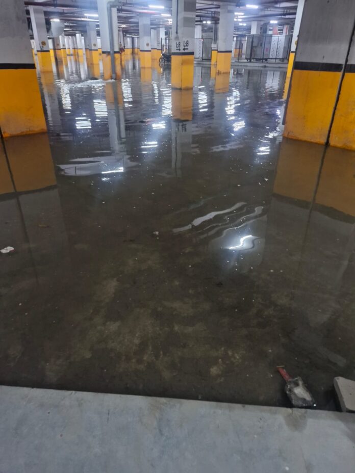Heavy rain leaves the basement and parking areas of Amrapali Golf Homes and Kingswood waterlogged in Greater Noida West, with residents reporting submerged vehicles and raising concerns over drainage and monsoon preparedness.