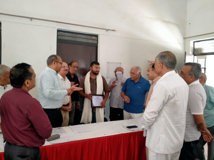 RWA Sector 51 felicitates Sambhav Jain and his mother during the General Body Meeting for his voluntary efforts to rescue snakes from residents’ homes and neighbourhood areas.