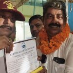 The newly elected ad hoc AOA team of Amrapali Golf Homes and Kingswood Society after securing a decisive victory, with residents congratulating the team and expressing hopes for transparent and effective governance.