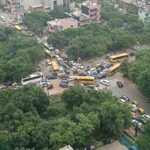 Daily traffic congestion at the RG Residency crossing in Sector 120, Noida, is causing inconvenience to thousands of residents, with school traffic, roadside parking and poor road infrastructure adding to the problem.