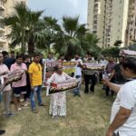 Residents of Supertech Ceaser Society in Omicron-1 stage a protest over alleged maintenance issues and demand the removal of YG Estate from the society’s maintenance operations. ( File photo)