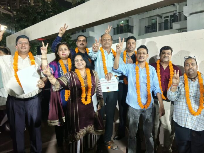 Newly elected AOA members of 11th Avenue, Gaur City-2, after Pragati GC-11 secured eight of the 10 seats in the society elections.