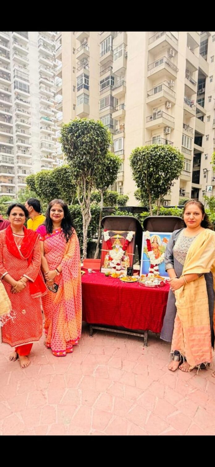 Members of Homes 121 Society in Noida celebrate Maharaja Agrasen Jayanti with traditional prayers and aarti.