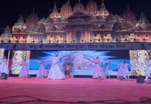 Devotees attend Ramleela performances at the Ecotech-12 ground in Greater Noida West on October 12 despite rainfall and waterlogging.