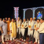 DD RWA Federation representatives with members of the Shri Dharmik Ramlila Committee during the Ramleela celebrations at Ramlila Maidan, Sector Pi, Aichhar, Greater Noida, on October 16, 2026.