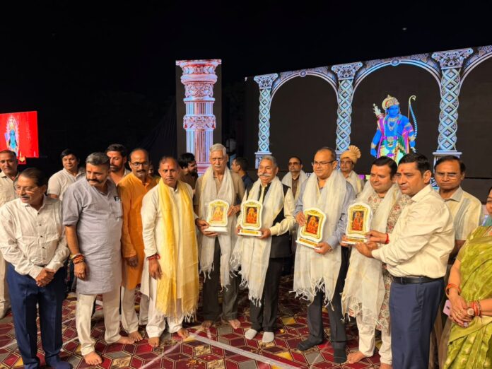DD RWA Federation representatives with members of the Shri Dharmik Ramlila Committee during the Ramleela celebrations at Ramlila Maidan, Sector Pi, Aichhar, Greater Noida, on October 16, 2026.
