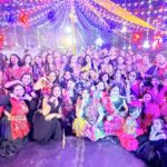 Residents of Lotus Villa enjoying dandia