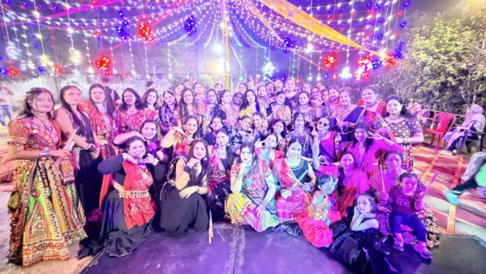 Residents of Lotus Villa enjoying dandia