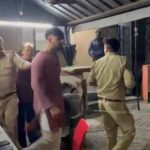 Residents of Amrapali Zodiac, Noida, gather at Sector 113 police station with NHRF and AOA representatives to seek action after a car without a number plate allegedly damaged several vehicles in the society.