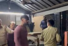 Residents of Amrapali Zodiac, Noida, gather at Sector 113 police station with NHRF and AOA representatives to seek action after a car without a number plate allegedly damaged several vehicles in the society.